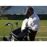 Technician Ryan Cannon of Live Oak Pest Control in Live Oak, Fla., pours Talstar XTRA granular insecticide featuring Verge technology into the hopper so he can treat Suwannee High School's fire ant problem.