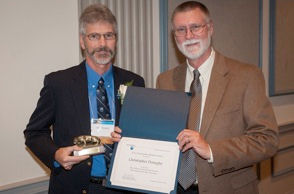 Residex CEO Chris Donaghy, left, is congratulated by Dr. Bruce McPheron, Penn State's Dean of the College of Agricultural Sciences, on his Outstanding Alumnus honor.