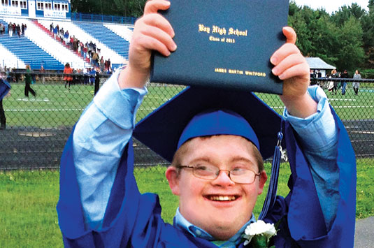 Jamie shows off the diploma he earned from Bay Village High School in Bay Village, Ohio.