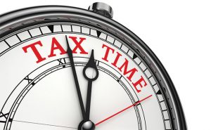 Clock showing tax time. Illustration: ©iStock.com/donskarpo