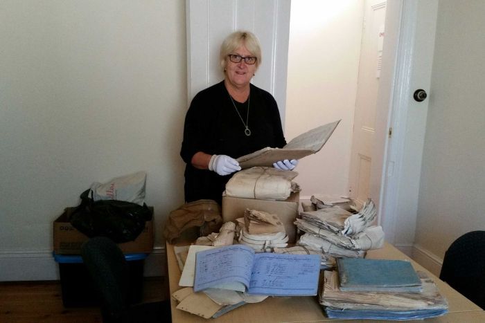 Morgan Council Heritage Officer Di Hausler is archiving the 138-year-old documents.Photo: Di Hausler / ABC Riverland