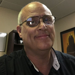 John Carroll, Photo: Truly Nolen