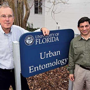 Drs. Koehler and Roberto Pereira stand in front of their home base at the University of Florida: the Urban Entomology building.Photo: PMP, 2015