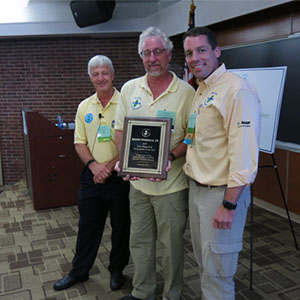 Ralph Citarella is awarded his Pest Management Professional of the Year plaque. PHOTO: NJPMA