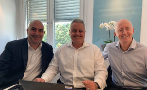 From left are Paul Giannamore of Potomac; Tony DiLucente, CFO of ServiceMaster; and Svein Olav Stölen, CEO of Nomor. PHOTO: THE POTOMAC CO.