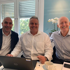 From left are Paul Giannamore of Potomac; Tony DiLucente, CFO of ServiceMaster; and Svein Olav Stölen, CEO of Nomor. PHOTO: THE POTOMAC CO.