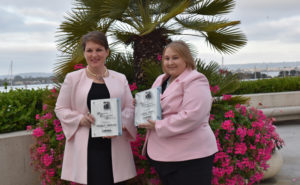 Bridget Anderson, Ecolab, and Ashley Sands, Future Services, receive the 2019 PWIPM Professional Empowerment Grant at PestWorld. PHOTO: DANIELLE PESTA