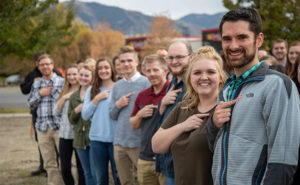Fox Pest team members display their pink ribbons at the Utah home office. PHOTO: FOX PEST CONTROL