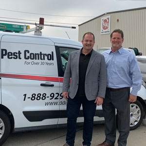Ben Miller, left, owner of AAI Pest Control, stands next to Kemp Anderson, right. PHOTO: KEMP ANDERSON CONSULTING