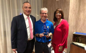 From left are Victor Aimi, the immediate past president for PRSA Greater Fort Lauderdale; Toby Srebnik; and Jennifer Hudson, the incoming chapter president. PHOTO: TRULY NOLEN