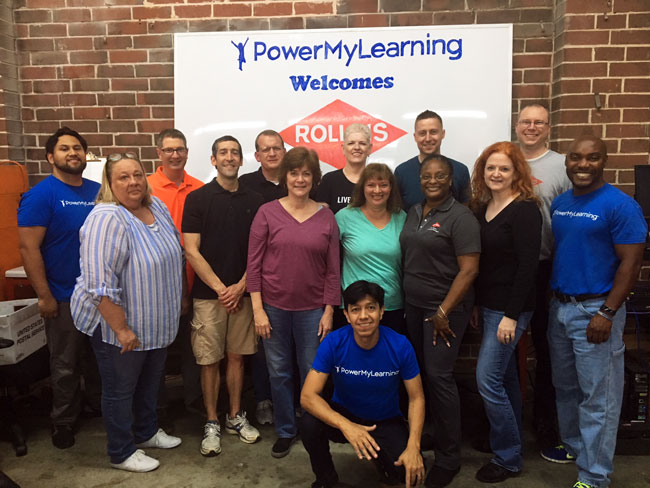 Rollins IT employees and PowerMyLearning volunteers gather during a warehouse day to refurbish computers. PHOTO: ROLLINS