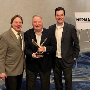 Tony DeJesus (center) is joined by Stephan Goldman, president (left), and Brian Goldman, CEO (right), of Big Blue Bug Solutions located in Providence, R.I. PHOTO: NEPMA