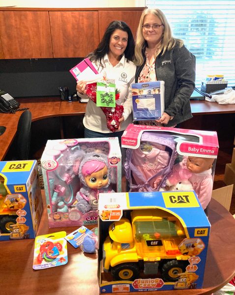 Andrea Hancock, VP of Mattress Safe, and Nicole Smith, project manager for Stockings with Care. PHOTO: DAVID HANCOCK