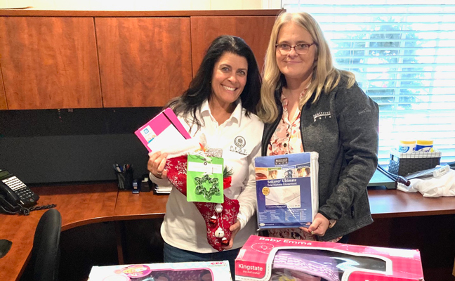 Andrea Hancock, VP of Mattress Safe, and Nicole Smith, project manager for Stockings with Care. PHOTO: DAVID HANCOCK