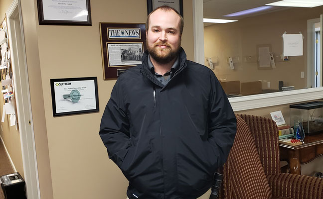 Jason Heiser, senior service team lead for Sherrill Pest Control, models the new three-in-one jacket. PHOTO: SHERRILL PEST CONTROL