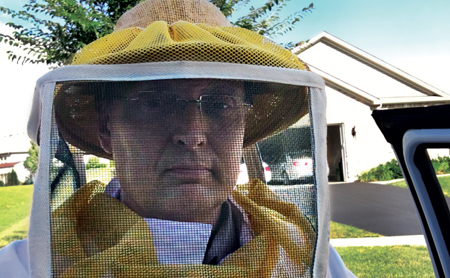 The author gears up for an aggressive yellowjacket job. PHOTO: PETE SCHOPEN