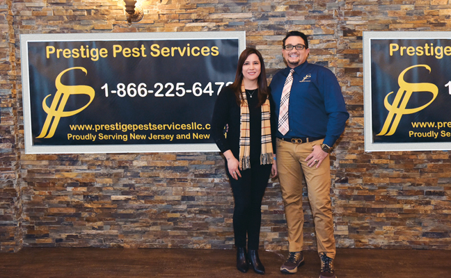 Karol and Favio Ulloa pose inside their PPS headquarters building in Hawthone, N.J. PHOTO: PRESTIGE PEST SERVICES