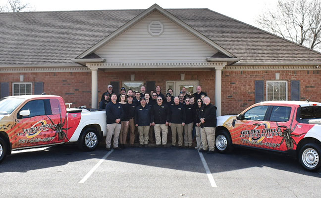 The Golden Circle team gathers in front of company headquarters. IMAGE: GOLDERN CIRCLE EXTERMINATORS