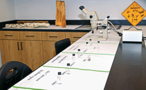 Specimens and a microscope were at the ready for attendees of the Rentokil Terminix Innovation Center’s open house event June 6. (Photo: Rentokil Terminix)