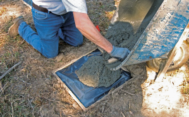 Fig. 2. Concrete slab soil sample (no PVC) plot during concrete pouring at the HEF in 2023. (PHOTO: US DEPARTMENT OF AGRICULTURE FOREST SERVICE)