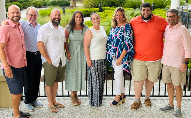 Arrow Exterminators at the GPCA Summer Conference in Jekyll Island, GA. From left to right: Mike Malone, Rick Bell, Xavier Cugnon, Roni Showalter, Alyson Gilleland, Shay Runion, Wyatt West and Jason Pelham. PHOTO: ARROW EXTERMINATORS