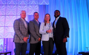 Darryl Blakey (right), manager, government affairs, BASF Corporation, was presented a RISE Volunteer Service Award during its Annual Meeting in San Diego for his work as Chair of the Legislative Affairs Committee in 2022-2024. Presenting the award is the RISE Executive Committee from left, Treasurer John Johnson, Prokoz; Vice Chair Todd Mason, Sipcam Agro; and RISE President Megan Provost. PHOTO COURTESY OF RISE 
