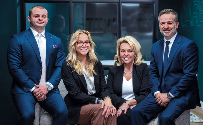 EPM is truly a family business. Pictured from right are Jason and Karen Carpenter, CEO and COO, respectively; their daughter, Kayla, a senior finance major at The Ohio State University with plans to join EPM after graduation; and their son Brandon, vice president of the company. PHOTO: JASON CARPENTER