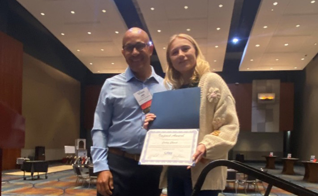 VPMA President John Reid, Accel Pest and Termite Control, presents the inaugural VPMA Board Impact Award to Carley Church, Getem Services. PHOTO: VPMA