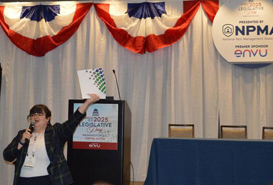 NPMA Coordinator of Legislative and Regulatory Affairs Jackie Ramsey shows attendees the info they need to take on their Hill visits. PHOTO: PMP STAFF