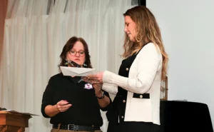 During the first night dinner reception, WIPC COO Nanette Rota presented Natalie Williams, an inspector for Pro 1 Solutions Pest Control in Kill Devil Hills, N.C., with the 2025 WIPC Salesperson of Year award. PHOTO: FOSTER BRUSCA