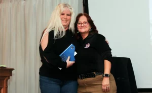 Rota, who is also owner of Praying Nantis Pest Control in Myrtle Beach, S.C., presented Seana Hall of Mighty Men Services in San Francisco, Calif., with the 2025 WIPC Technician of the Year award. PHOTO: FOSTER BRUSCA