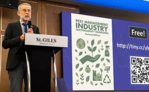 Stephen Doggett standing at podium during FAOPMA