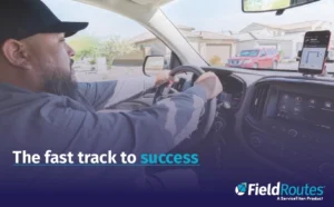 Man driving service vehicle with FieldRoutes logo and slogan overlay