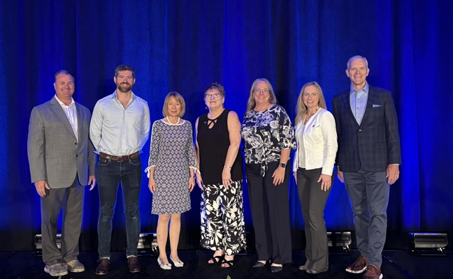 from left: Todd Mason, Evan Bortzfield, Kathy Bishop, Julie Schlekau, pictured with the RISE Executive Committee, Karen Larson, Megan Provost and Neil Cleveland