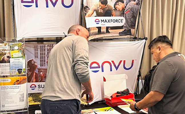 Eric Picard of Envu, guiding an attendee through the purchasing process of Envu product. IMAGE: PMP STAFF