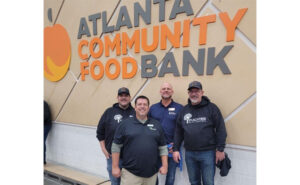 Peachtree Pest Control employees aid the ACFB. IMAGE: PEACHTREE PEST CONTROL