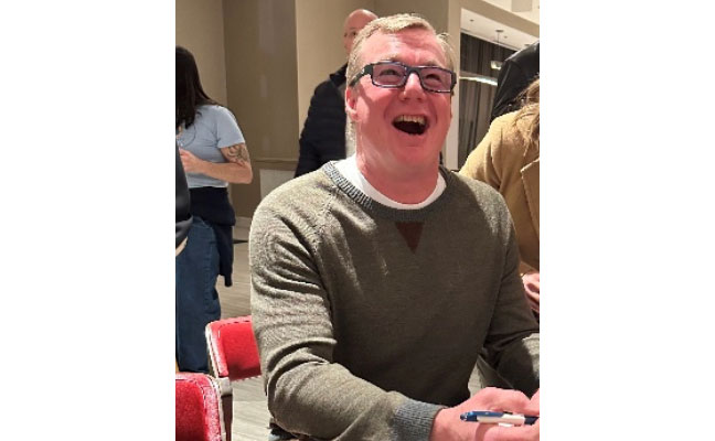 MGK's Tommy Powell finally filled out his application to join Pi Chi Omega during the GPCA Raise the Bar event. He took a little (a lot of) good-natured ribbing. IMAGE: PI CHI OMEGA