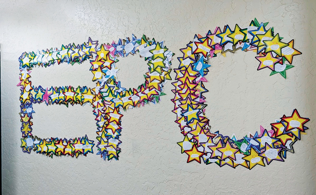 EPC’s “Five-Star Review Wall” and weekly drawing is a popular program among employees. (Photo: Environmental Pest Control)